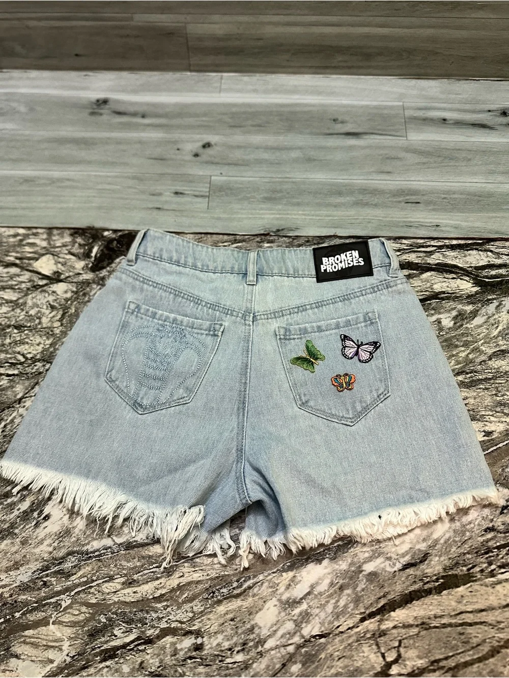 Broken Promises Two-Tone White & Light Blue Distressed Denim Shorts